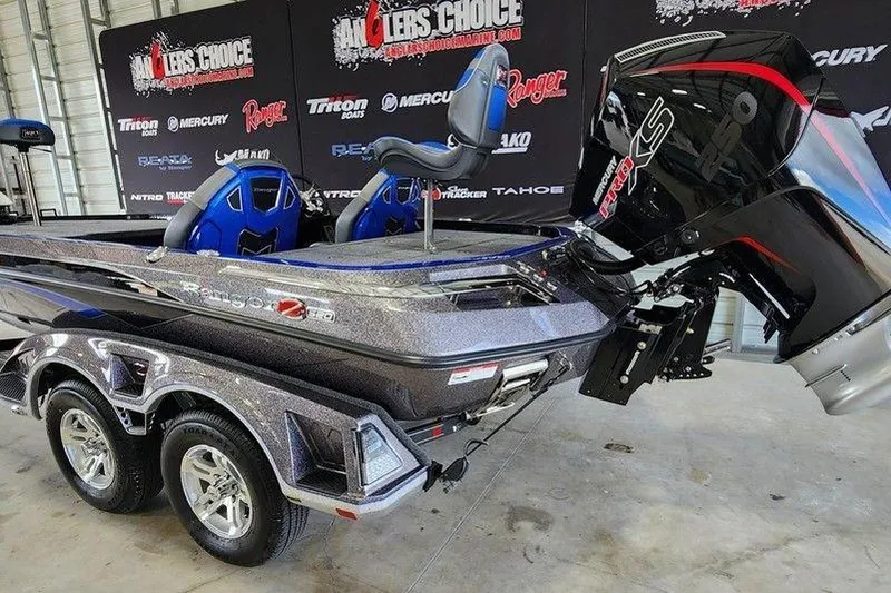 Slide: The Image of 2025 Ranger Z520 boat with powerful engine, displayed at Anglers Choice event. - 1