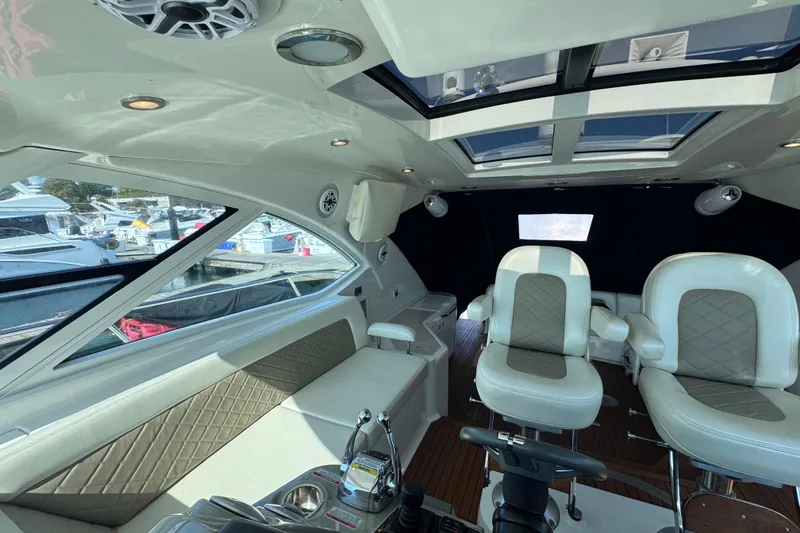 Slide: The Image of Luxurious interior of 2011 Sea Ray 540 Sundancer yacht with plush seating and modern design. - 33