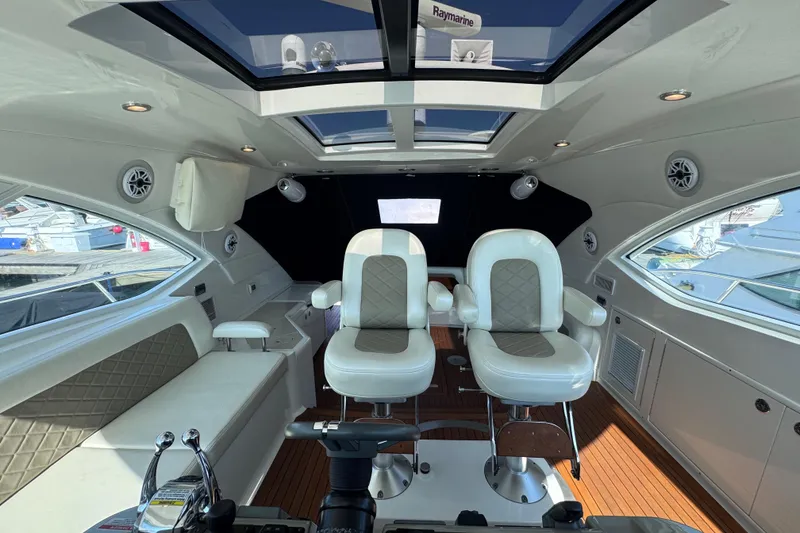 Slide: The Image of Luxurious interior of 2011 Sea Ray 540 Sundancer yacht with plush seating and modern design. - 34
