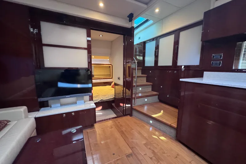 Slide: The Image of Luxurious interior of 2011 Sea Ray 540 Sundancer yacht with modern amenities and elegant design. - 43