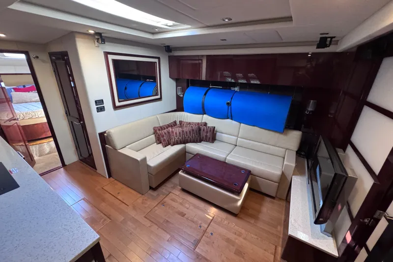Slide: The Image of Luxurious interior of 2011 Sea Ray 540 Sundancer yacht with elegant seating and modern decor. - 46