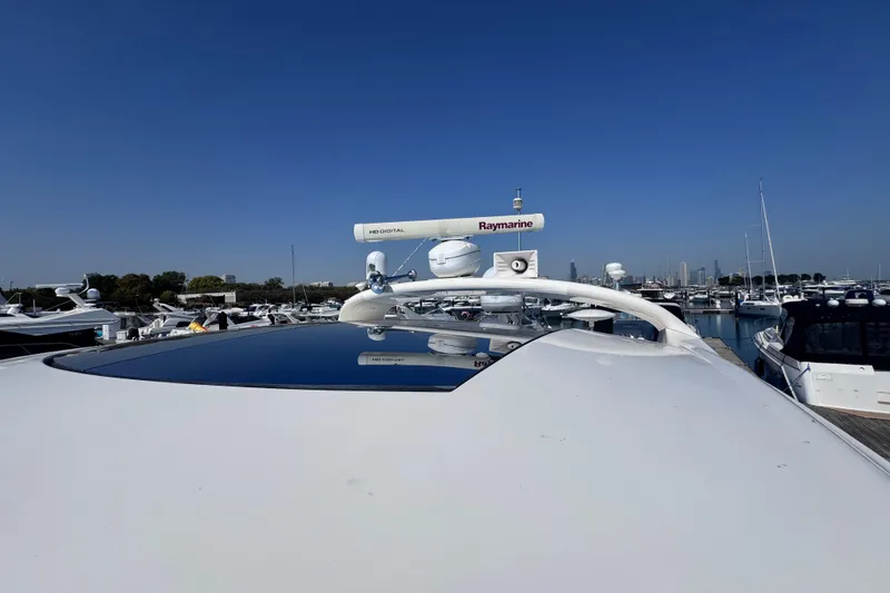 Slide: The Image of 2011 Sea Ray 540 Sundancer yacht with Raymarine equipment in marina. - 5