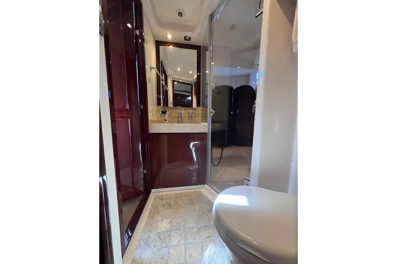 Slide: The Image of Luxurious bathroom in 2011 Sea Ray 540 Sundancer yacht with modern fixtures and elegant design. - 54