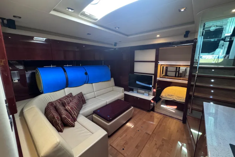 Slide: The Image of Luxurious interior of 2011 Sea Ray 540 Sundancer yacht with cozy seating and modern amenities. - 57