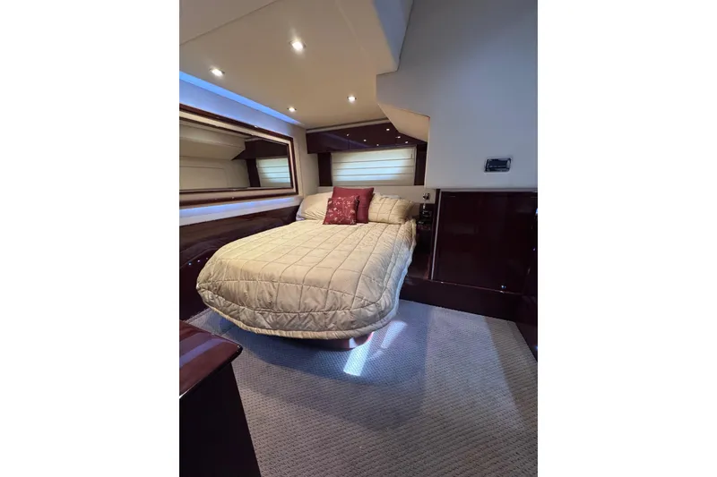 Slide: The Image of Luxurious cabin interior of 2011 Sea Ray 540 Sundancer yacht with cozy bed and elegant decor. - 65