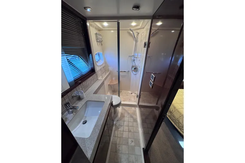 Slide: The Image of Luxurious bathroom in 2011 Sea Ray 540 Sundancer yacht with modern fixtures. - 66