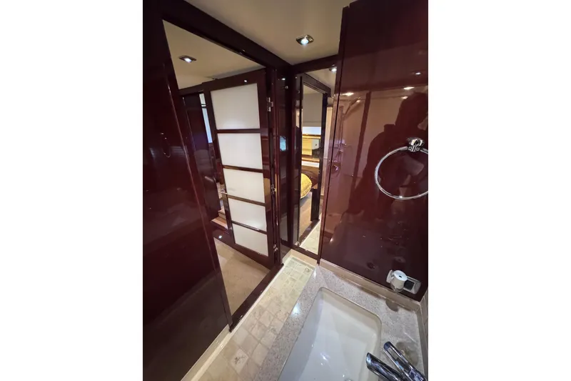 Slide: The Image of Luxurious interior of 2011 Sea Ray 540 Sundancer yacht bathroom with modern design. - 68