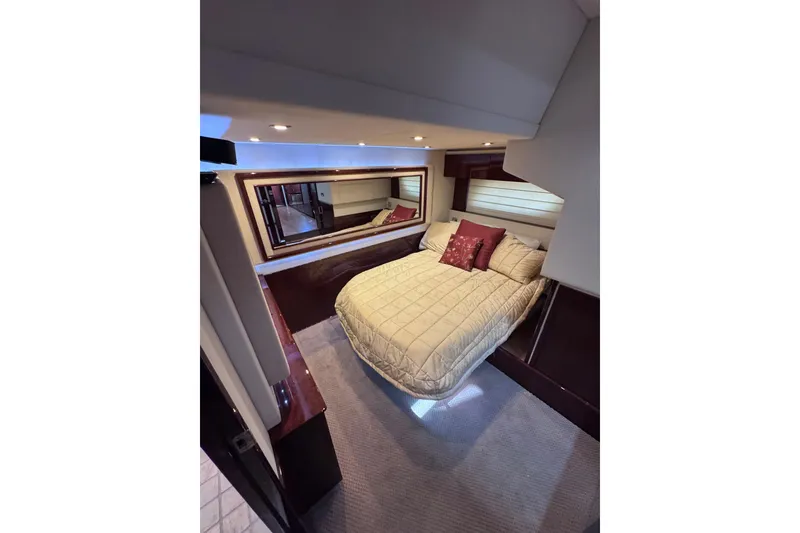 Slide: The Image of Luxurious bedroom interior of 2011 Sea Ray 540 Sundancer yacht with elegant bedding. - 70