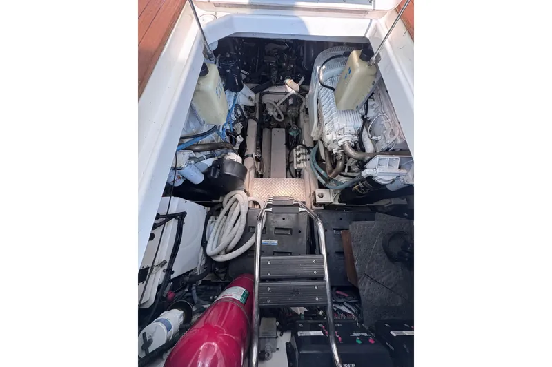 Slide: The Image of Engine room of 2011 Sea Ray 540 Sundancer yacht, showcasing mechanical components and equipment. - 72