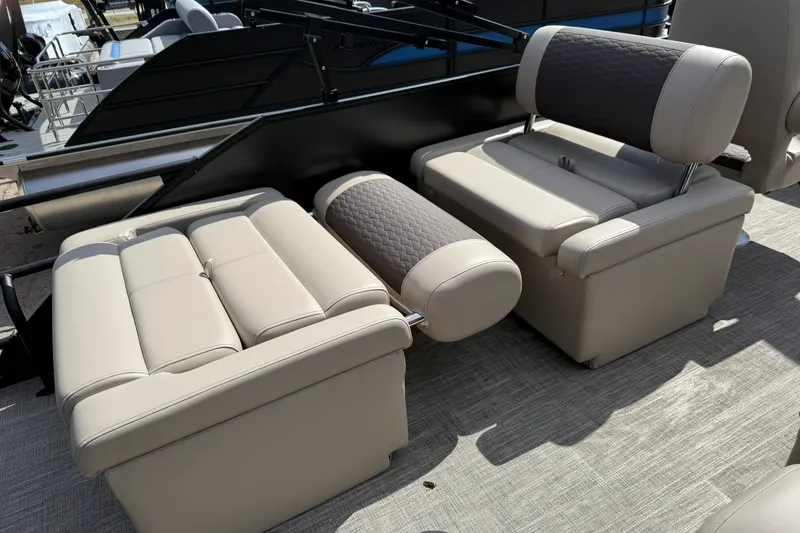 Slide: The Image of Luxurious seating on a 2026 Bentley Pontoons Elite 223 QSB boat, featuring beige upholstery. - 12