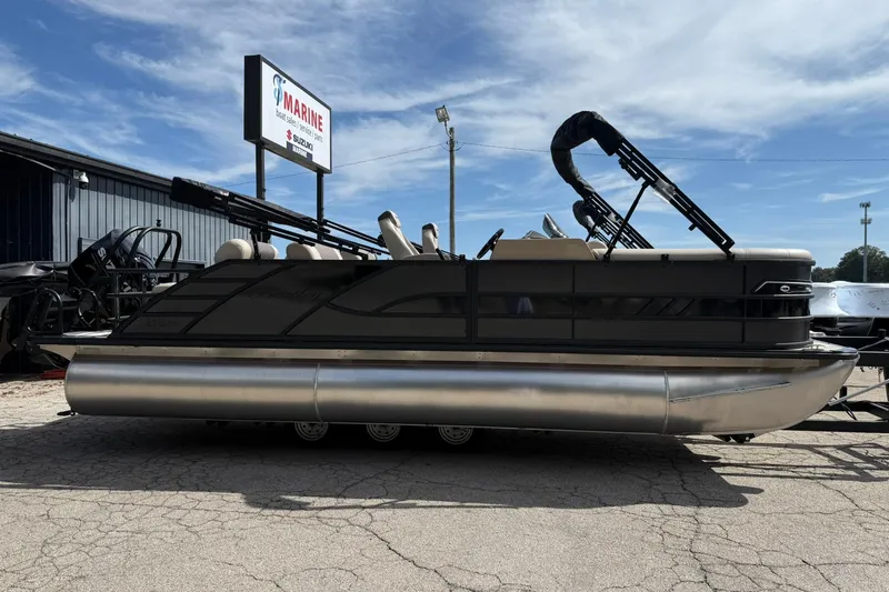 Slide: The Image of 2026 Bentley Pontoons Elite 223 QSB pontoon boat displayed outdoors under a clear sky. - 2