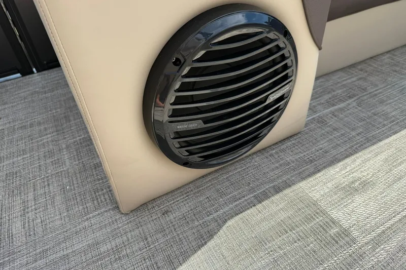 Slide: The Image of Marine-grade speaker on Bentley Pontoons Elite 223 QSB, 2026 model, with beige interior. - 8