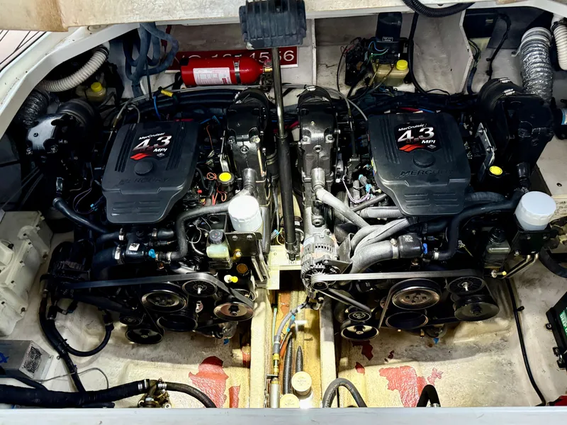 Slide: The Image of Engine compartment of a 2006 Sea Ray 290 Sundancer with twin MerCruiser 4.3 MPI engines. - 32