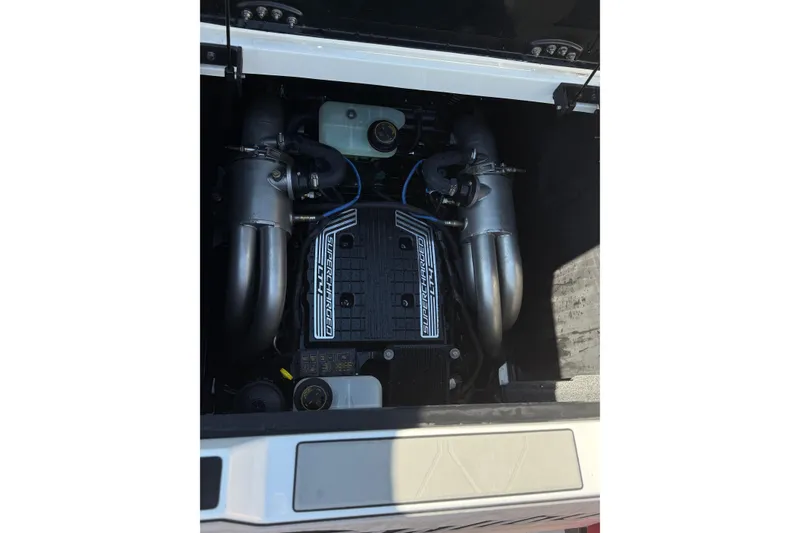 Slide: The Image of 2021 Malibu M240 engine compartment with supercharged LT4 engine components visible. - 16