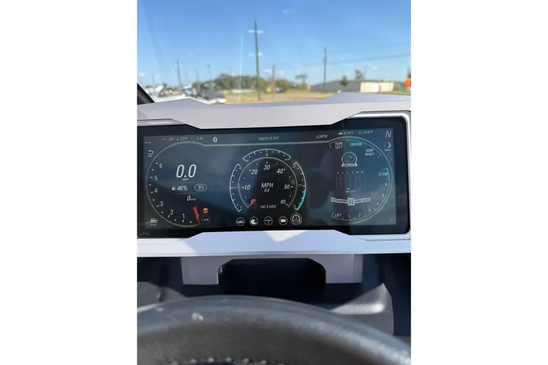 Slide: The Image of 2021 Malibu M240 dashboard display showing speedometer and control settings. - 19