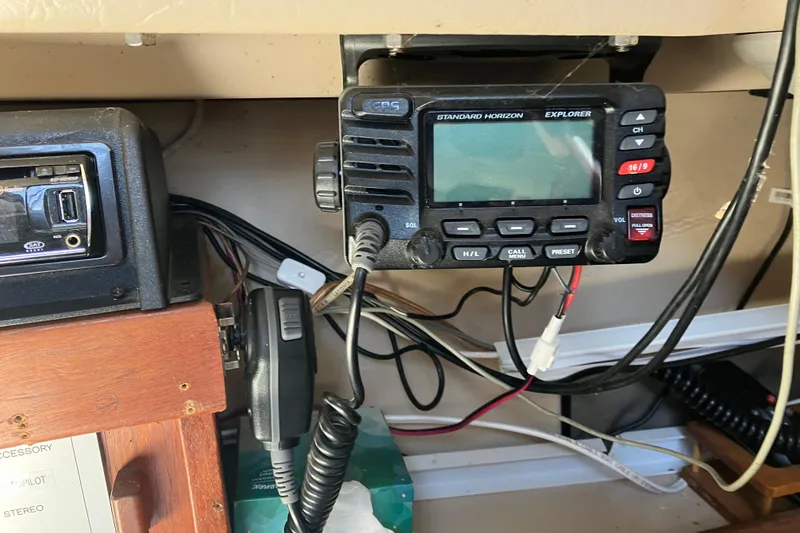 Slide: The Image of Boat radio equipment on a 1985 Catalina 30, featuring a Standard Horizon Explorer GPS. - 38