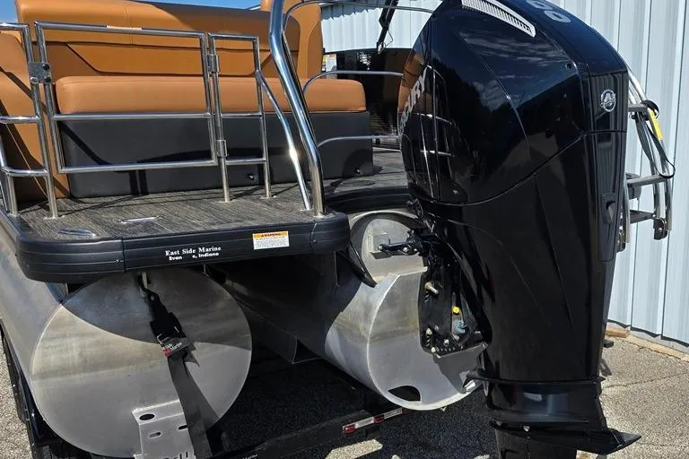 Slide: The Image of 2021 Godfrey Monaco 235 SFL pontoon boat with powerful outboard motor. - 10