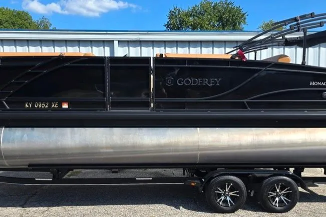 Slide: The Image of 2021 Godfrey Monaco 235 SFL pontoon boat on trailer, side view. - 14