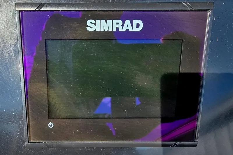 Slide: The Image of Simrad display on 2021 Godfrey Monaco 235 SFL boat dashboard. - 16