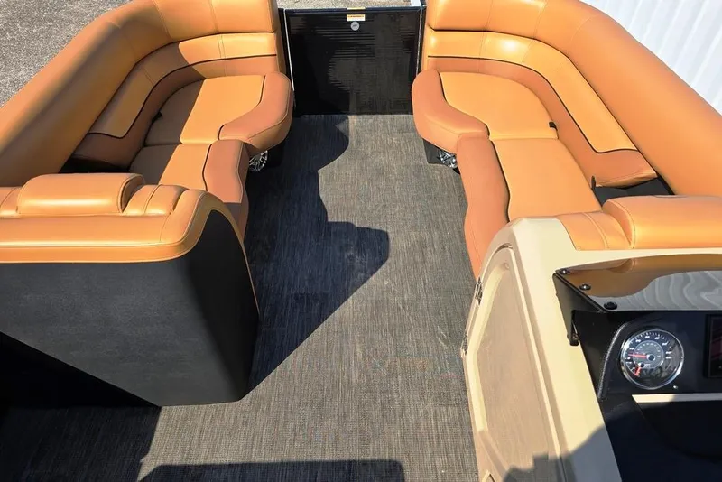 Slide: The Image of Luxurious seating on 2021 Godfrey Monaco 235 SFL pontoon boat, featuring tan upholstery. - 4
