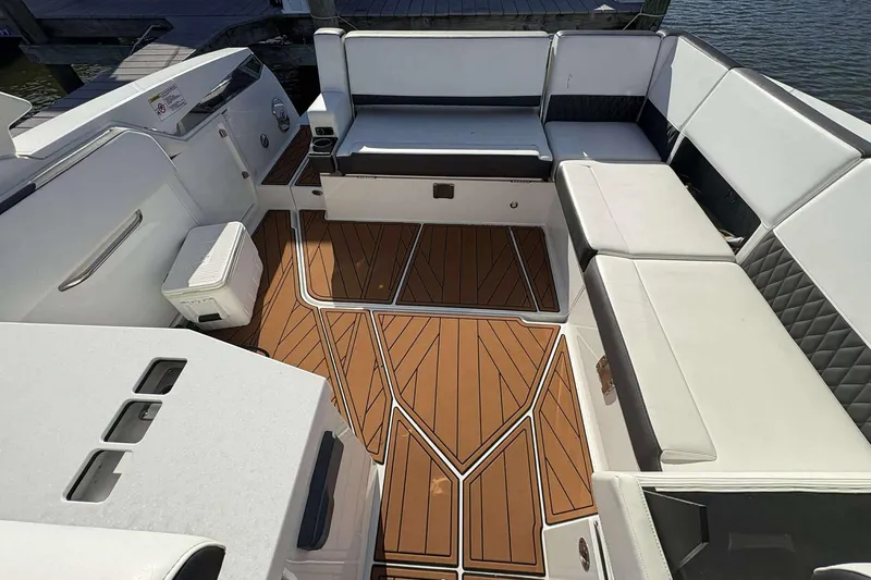 Slide: The Image of Interior of 2020 Monterey 378SS Super Sport boat with stylish seating and teak flooring. - 6