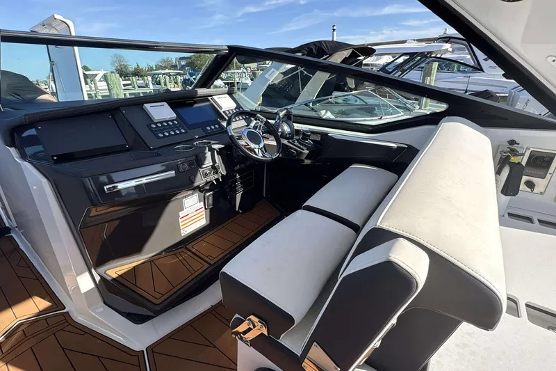 Slide: The Image of 2020 Monterey 378SS Super Sport boat cockpit with modern controls and seating. - 7