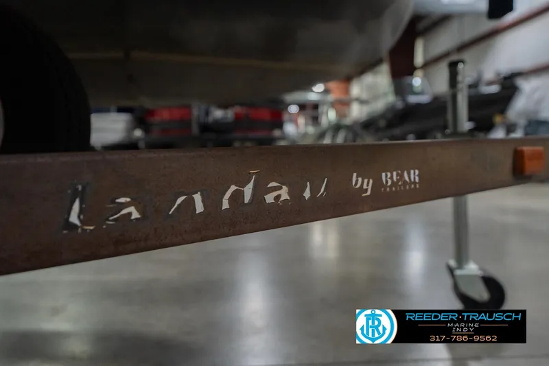 Slide: The Image of Rusty Landau DX24 trailer frame by Bear Trailers in a workshop setting. - 58