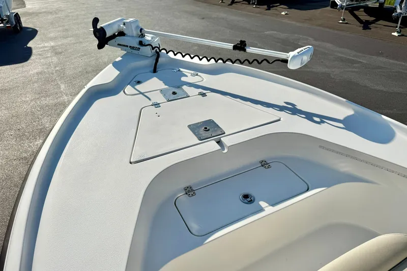 Slide: The Image of 2022 Key West 188 Bay Reef boat deck with trolling motor, sunny day. - 10