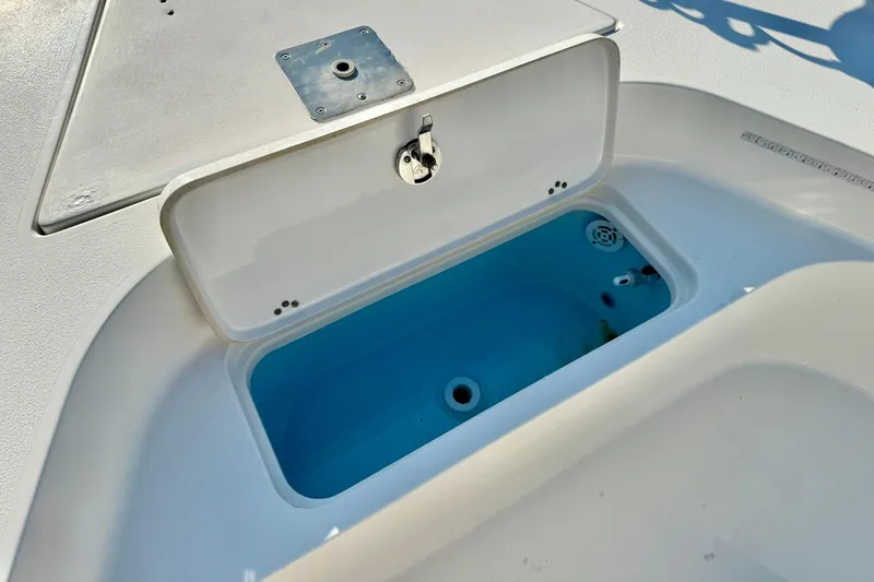 Slide: The Image of Open storage compartment on 2022 Key West 188 Bay Reef boat. - 13