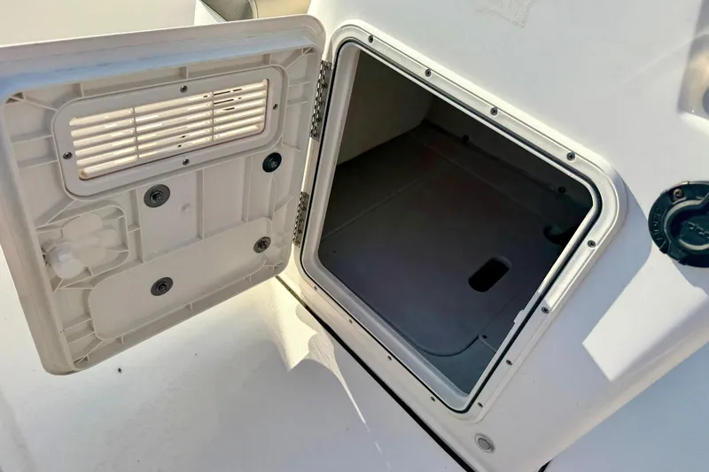 Slide: The Image of Open storage compartment on 2022 Key West 188 Bay Reef boat. - 24