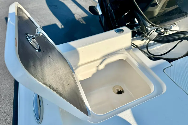 Slide: The Image of Open storage compartment on 2022 Key West 188 Bay Reef boat. - 27