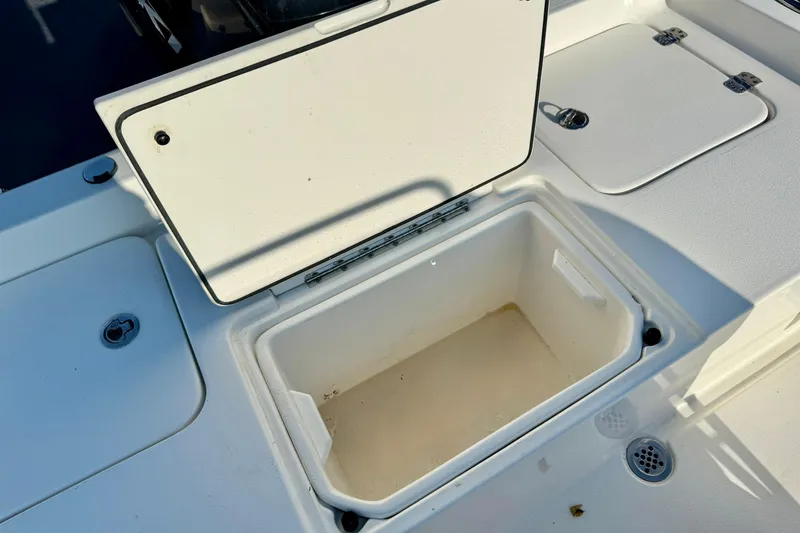 Slide: The Image of Open storage compartment on 2022 Key West 188 Bay Reef boat deck. - 29