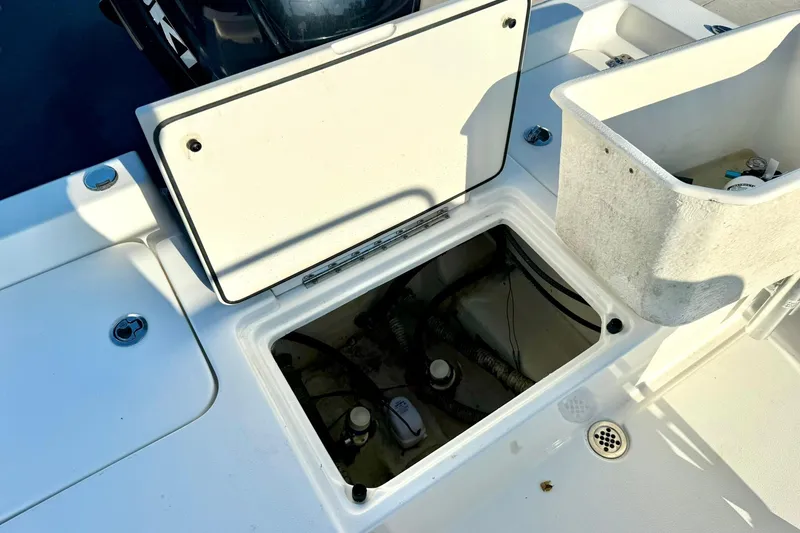 Slide: The Image of Open storage compartment on 2022 Key West 188 Bay Reef boat deck. - 30
