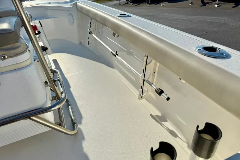 Slide: The Image of 2022 Key West 188 Bay Reef boat interior with rod holders and seating. - 31
