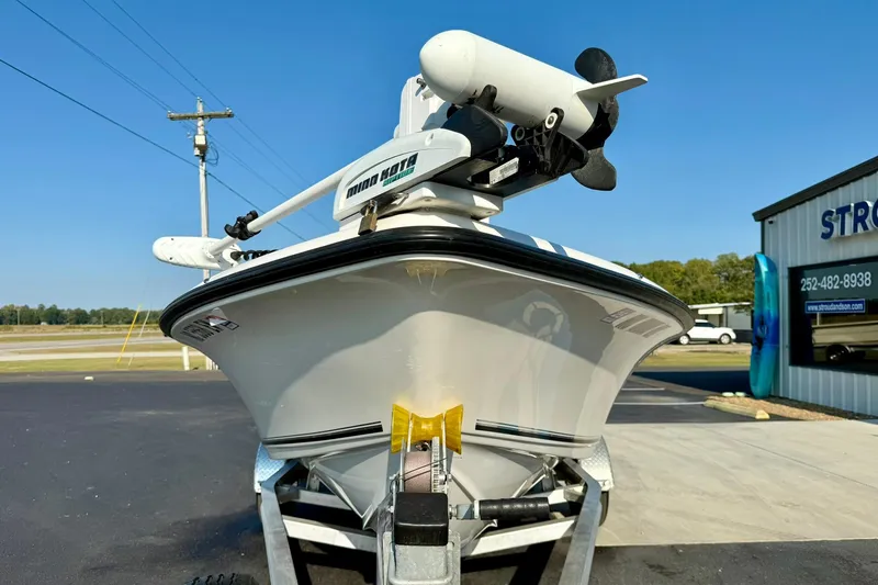 Slide: The Image of 2022 Key West 188 Bay Reef boat on trailer, featuring Minn Kota trolling motor. - 8