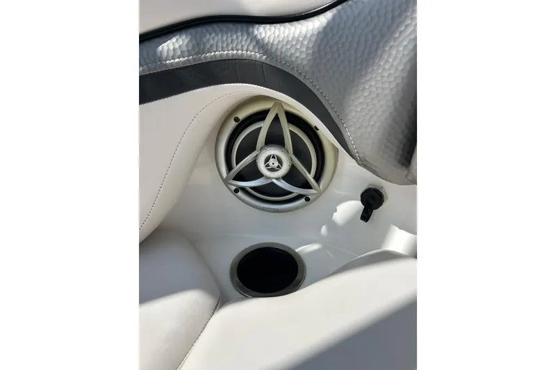 Slide: The Image of Speaker and cup holder on 2008 Yamaha 212X boat interior. - 20