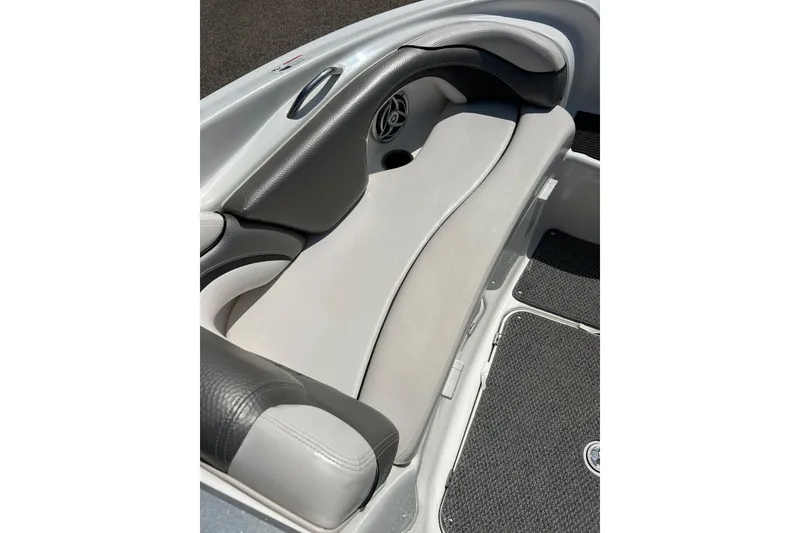 Slide: The Image of 2008 Yamaha 212X boat interior with gray seating and black accents. - 23