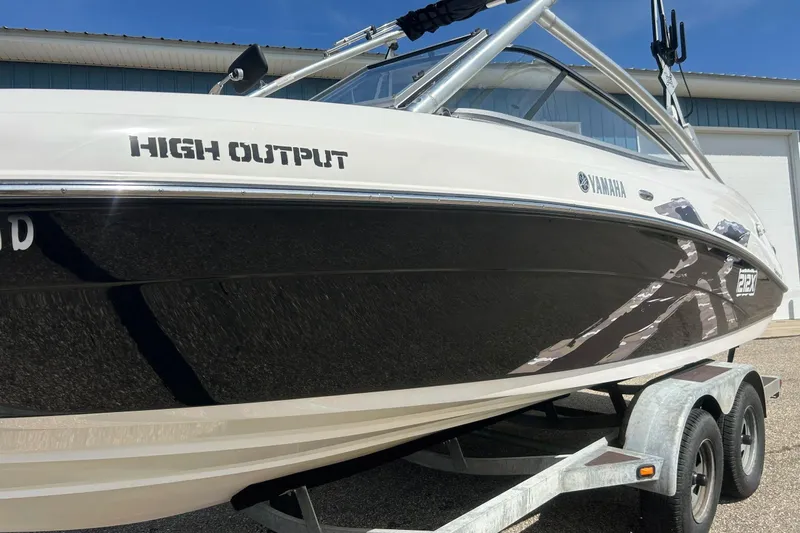 Slide: The Image of 2008 Yamaha 212X boat on trailer, featuring "High Output" label and sleek design. - 31