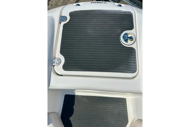 Slide: The Image of Yamaha 212X 2008 boat hatch with black non-slip surface and latch. - 35