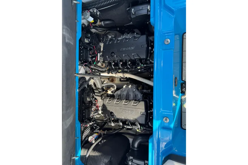Slide: The Image of Engine compartment of 2022 Yamaha Boats 255XD, showcasing dual engines and wiring. - 8
