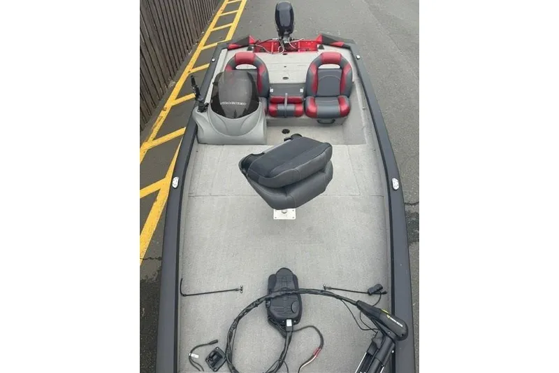 Slide: The Image of 2008 Tracker Pro Team 175 TXW fishing boat with seating and equipment on deck. - 3