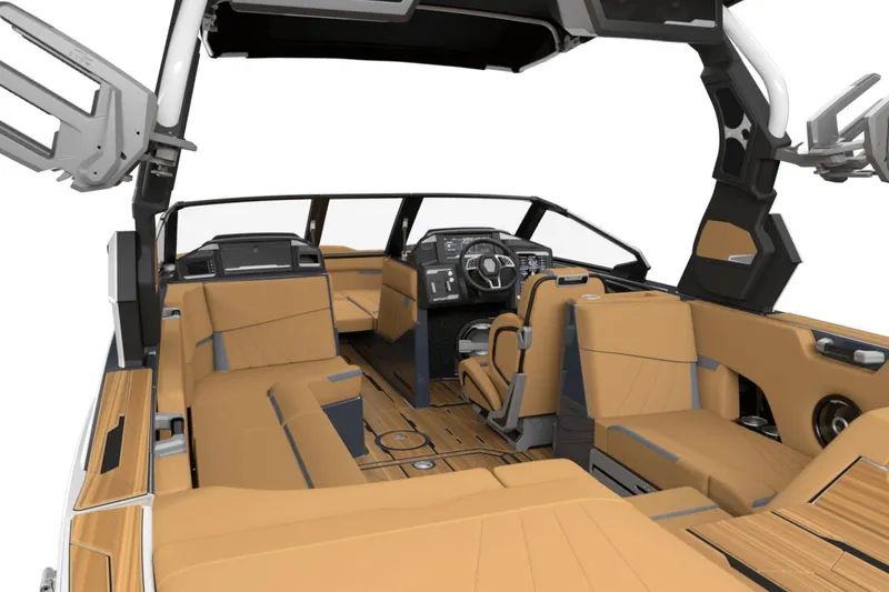 Slide: The Image of Manufacturer Provided Image: 2025 Supra SA boat interior with tan seating and modern dashboard design. - 13