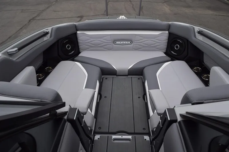 Slide: The Image of 2025 Supra SA boat interior with gray seating and modern design. - 8