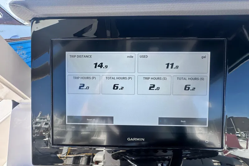 Slide: The Image of 2024 Pursuit S 288 Sport boat display showing trip distance and fuel usage. - 15