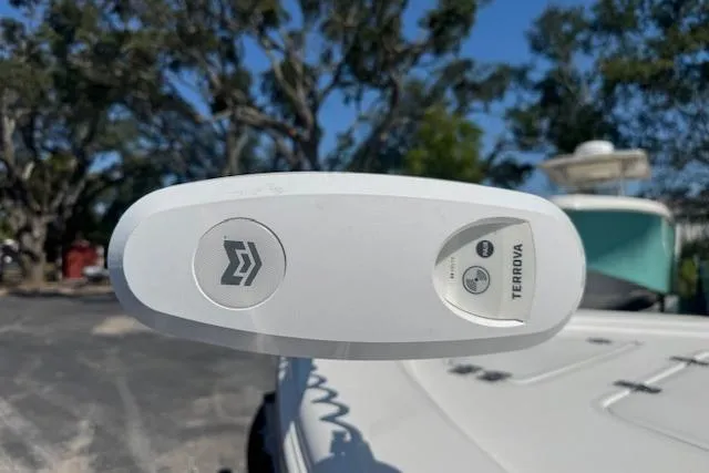 Slide: The Image of 2024 Sea Pro 210 Bay boat with Terrova trolling motor, outdoor setting. - 7