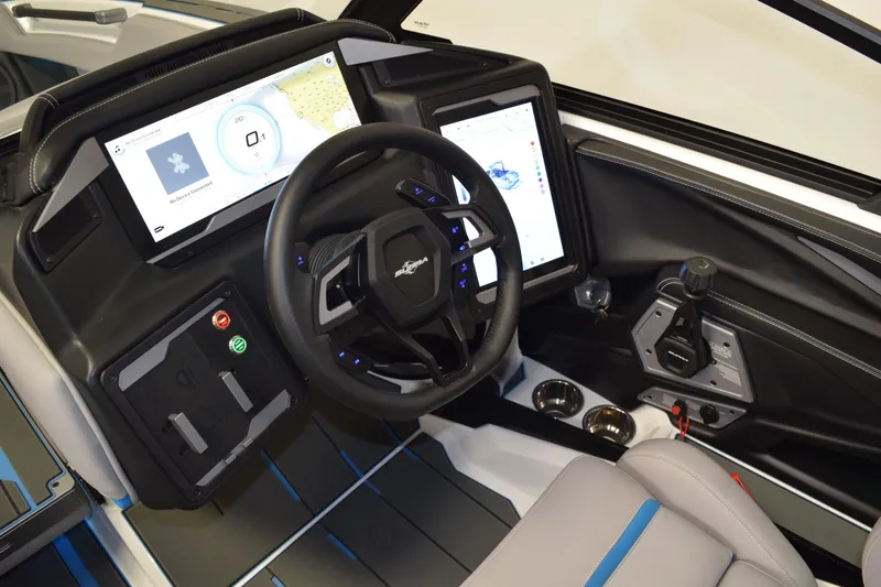 Slide: The Image of 2026 Supra SA boat cockpit with advanced digital displays and modern steering wheel. - 18