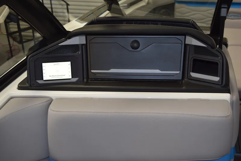 Slide: The Image of 2026 Supra SA boat dashboard with touchscreen and storage compartments. - 22