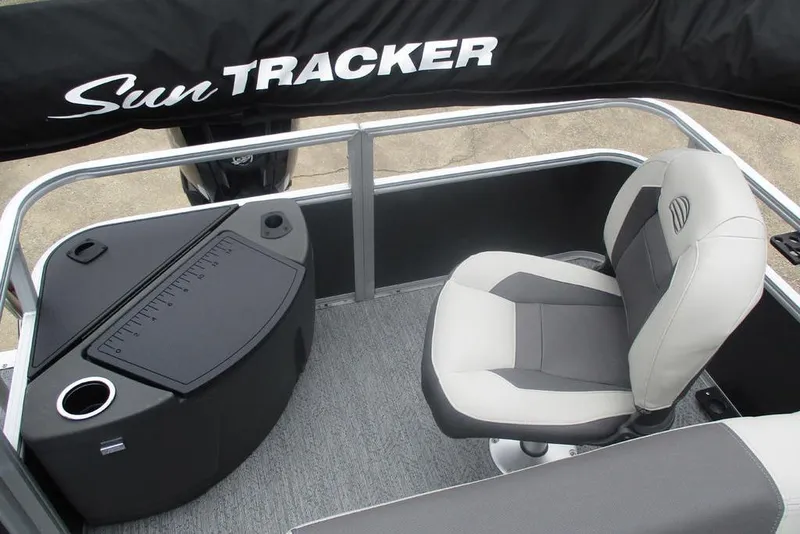 Slide: The Image of 2026 Sun Tracker Bass Buggy 18 DLX pontoon boat interior seating with cup holders. - 10