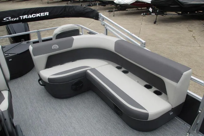 Slide: The Image of 2026 Sun Tracker Bass Buggy 18 DLX pontoon boat, rear view, on trailer. - 11