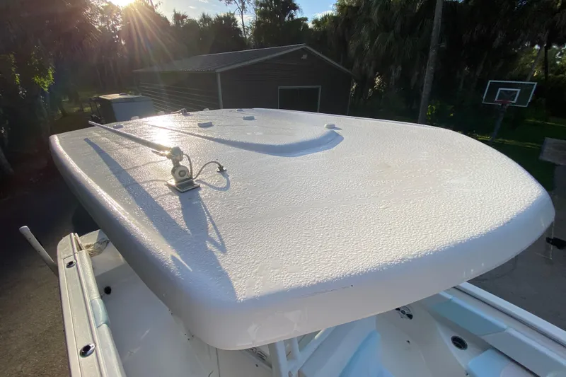 Slide: The Image of Storage compartment of 2020 Robalo Center Console boat with safety gear bag. - 28